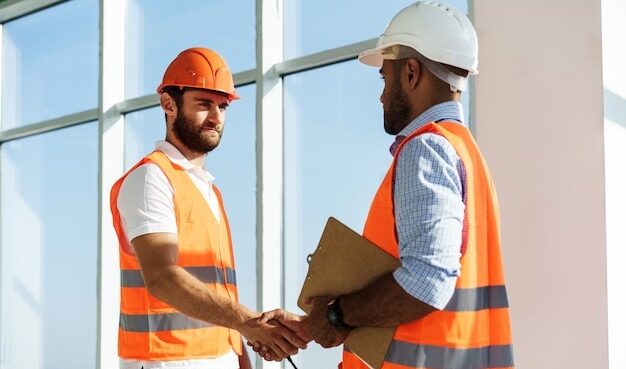 two men engineers workwear shaki